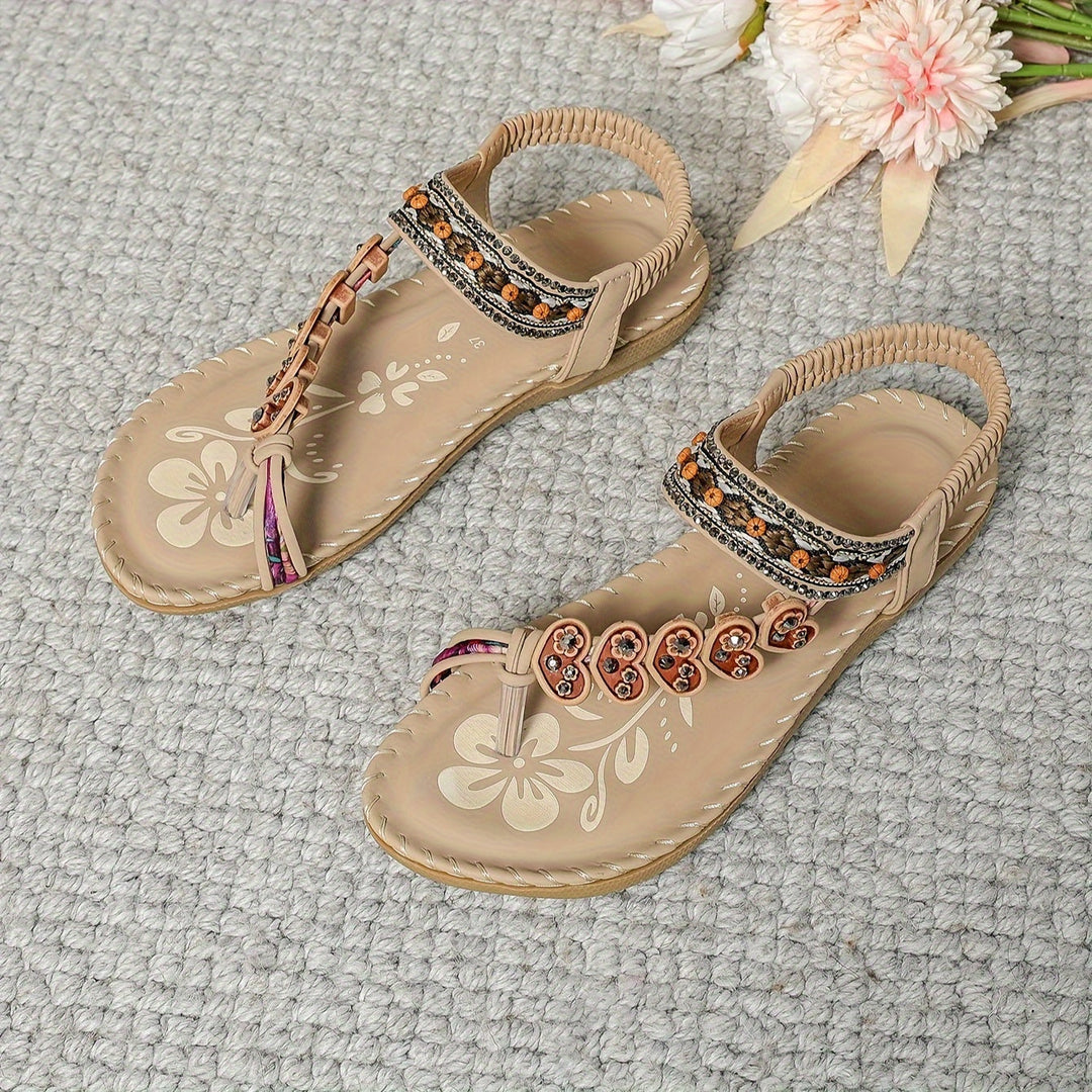 Stylish toe ring flat sandals for women, adorned with shimmering rhinestones and colorful beads.