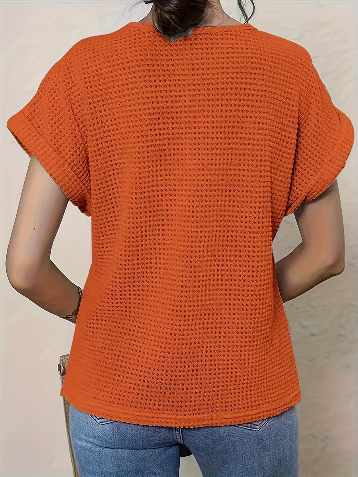Casual women's short sleeve textured top, boho style, comfortable for versatile everyday wear.