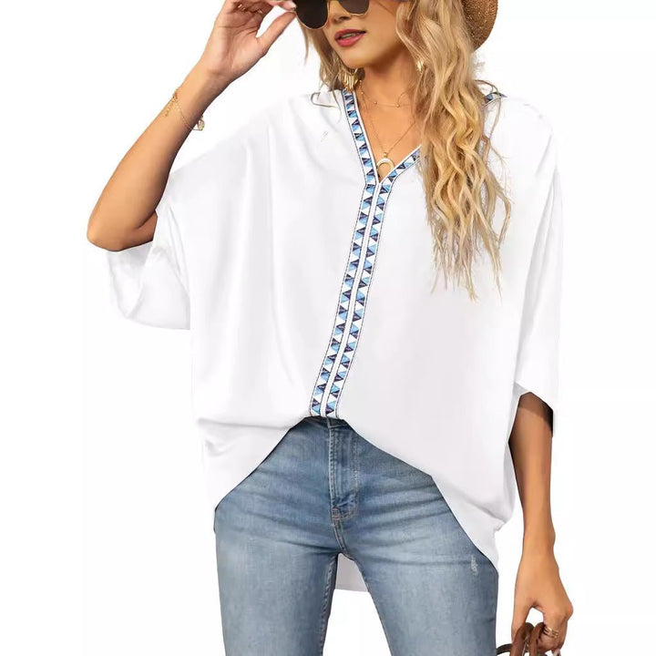 Effortless women's boho blouse, V-neck geometric trim, half sleeve, oversized, ideal for warm weather.