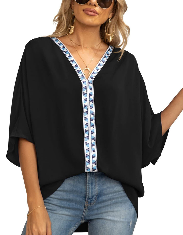 Chic geometric V-neck women's tunic top, half sleeve, oversized and flowy, perfect for summer fashion.