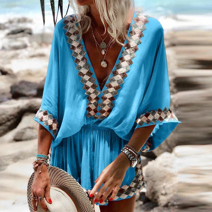 Women's boho V-neck romper jumpsuit with a flowy fit, perfect for casual summer outings, beach, or vacation style.