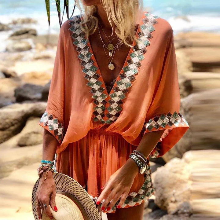 Effortless women's boho V-neck short romper, ideal for trendy summer wear, vacation, or beach outfits.