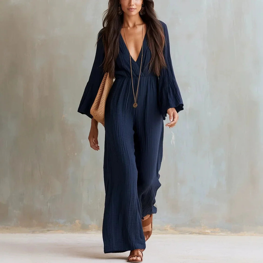 Elegant women's boho jumpsuit featuring a deep V-neck and wide legs, perfect for resort wear or casual chic.