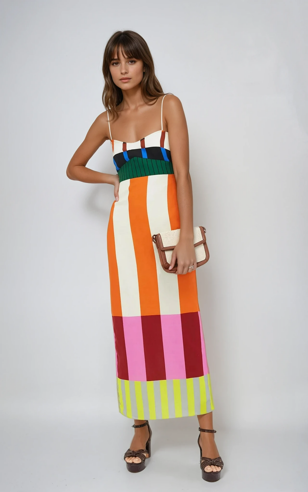 Trendy women's colourblock stripe midi dress with spaghetti straps, a chic statement summer dress.