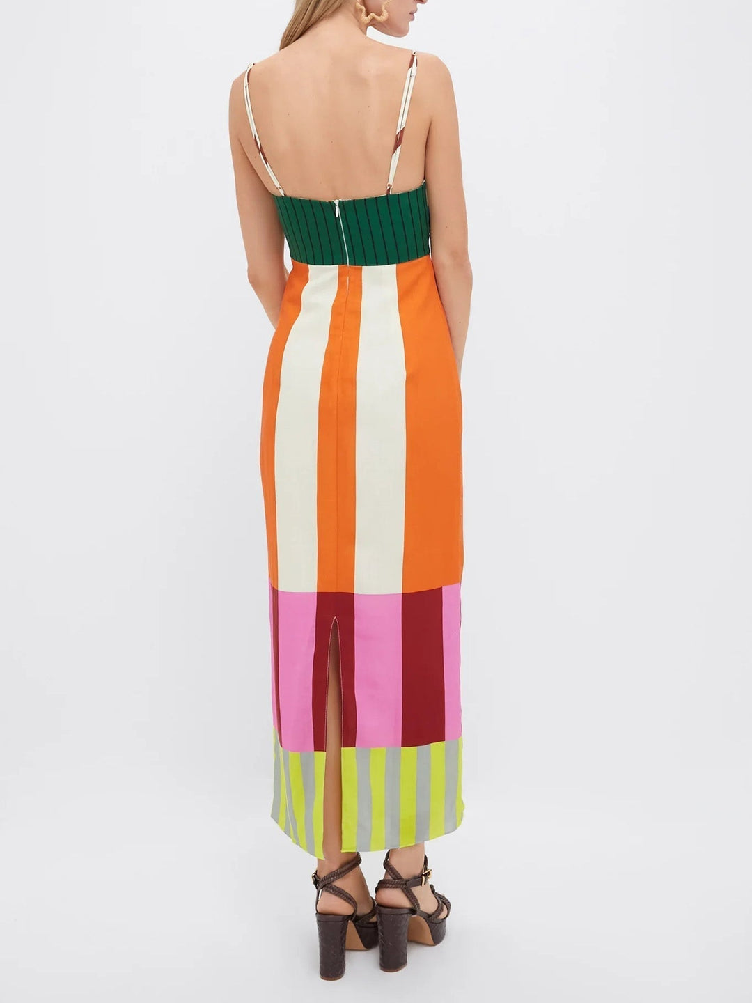 Vibrant women's bodycon spaghetti strap midi dress, perfect as a trendy statement summer dress.