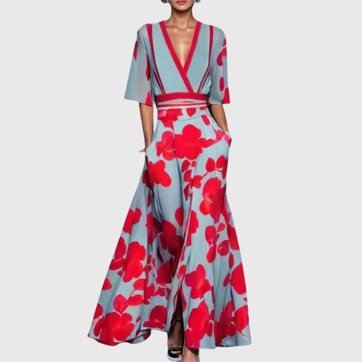 Stylish women's V-neck flowy maxi dress with a bold floral print, ideal as a comfortable yet elegant summer statement piece.