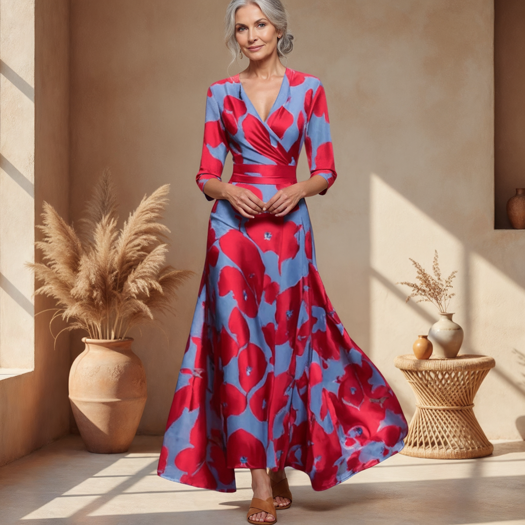 Women's bold floral wrap maxi dress with V-neck, flowy skirt, and three-quarter sleeves. Perfect for summer events.