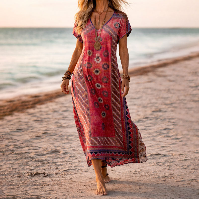 Bohemian style women's floral maxi dress featuring a V-neck & flowy design, great for summer festivals.