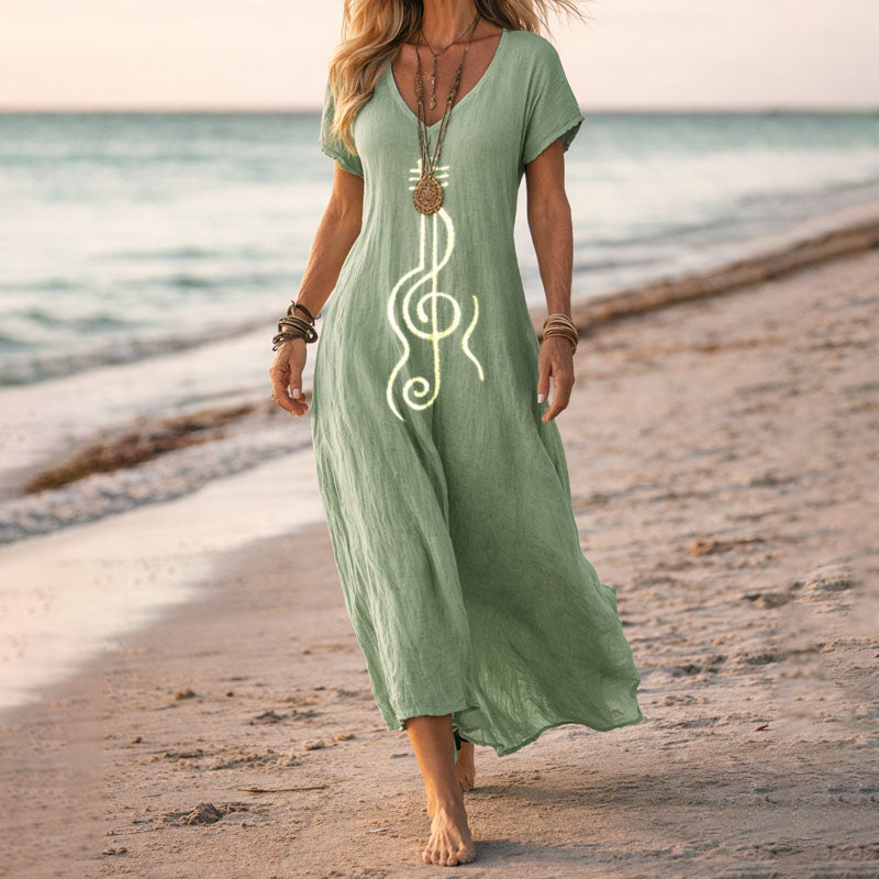 Elegant women's V-neck maxi dress with a beautiful botanical floral pattern, perfect for vacation wear.