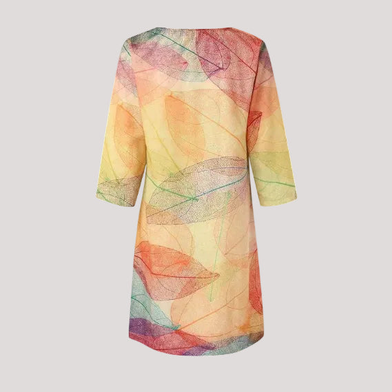 Relaxed fit women's midi dress with beautiful botanical print, a comfortable casual dress for warm weather.