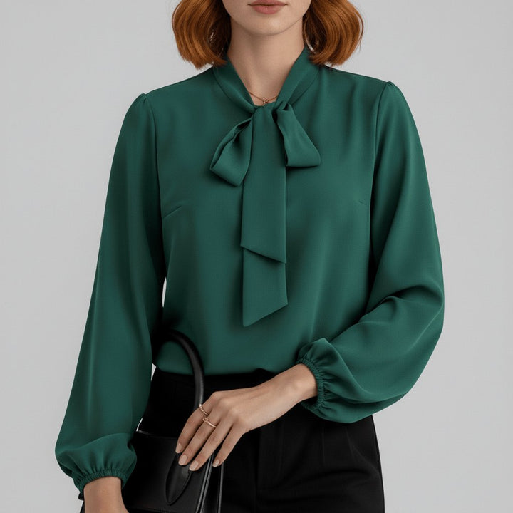 Elegant women's blouse with bow tie neck & puff sleeves, versatile for work or formal events.