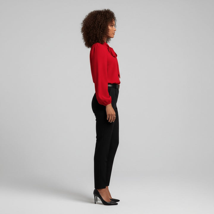 Versatile women's puff sleeve blouse with a pretty bow tie neck, suitable for any stylish occasion.