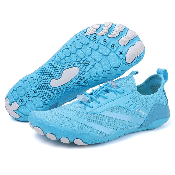 Close-up of breathable mesh upper on women's barefoot training shoes, maximum airflow & comfort.