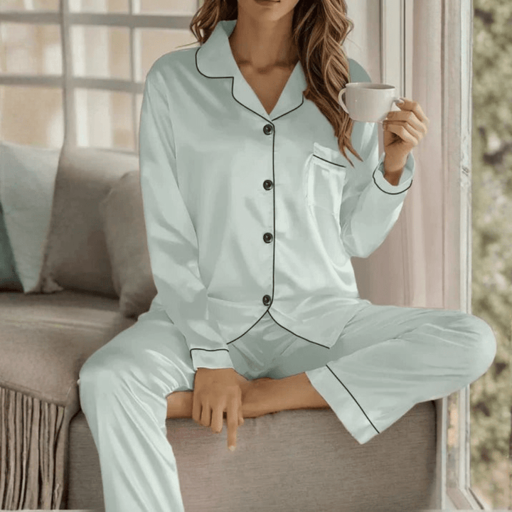 Chic women's button-front pajama set, breathable and soft for ultimate nightwear comfort.