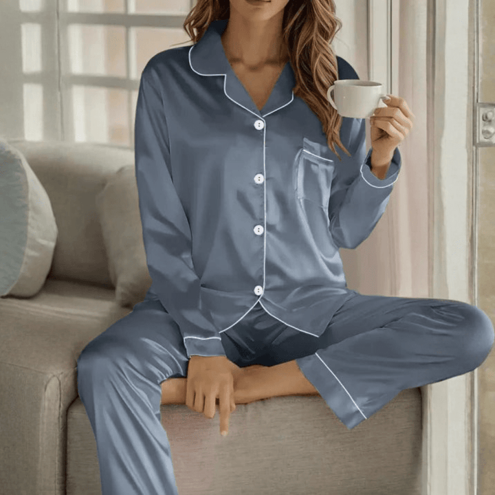Women's nightwear set: breathable fabric, button-front shirt, and comfy pants.