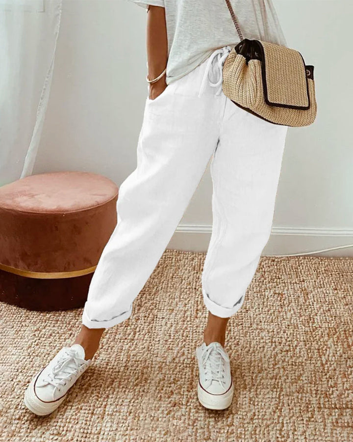 Side view of women's full-length comfort pants, offering a flattering, breathable fit for all-day wear.