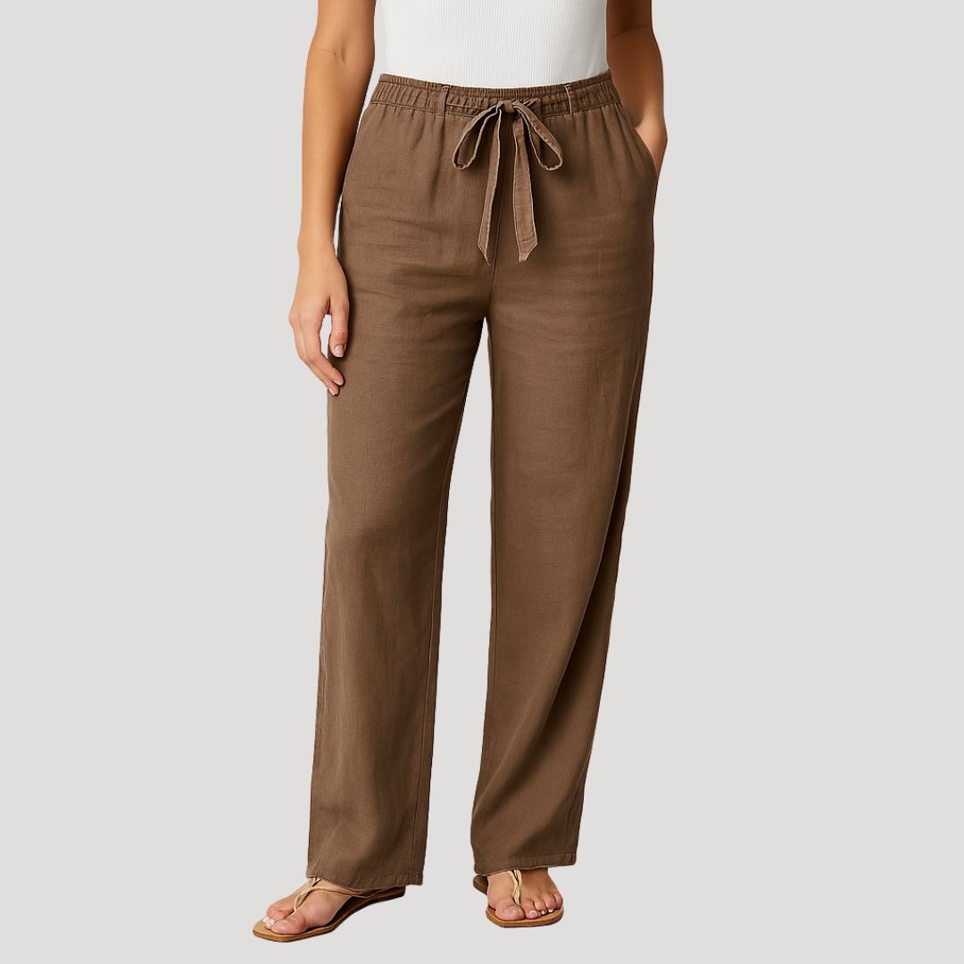 Close-up of women's relaxed fit linen drawstring pants, highlighting straight leg and breathable fabric.