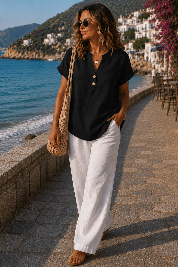 Women's breathable long sleeve shirt with button detail, relaxed fit, perfect for casual everyday wear.