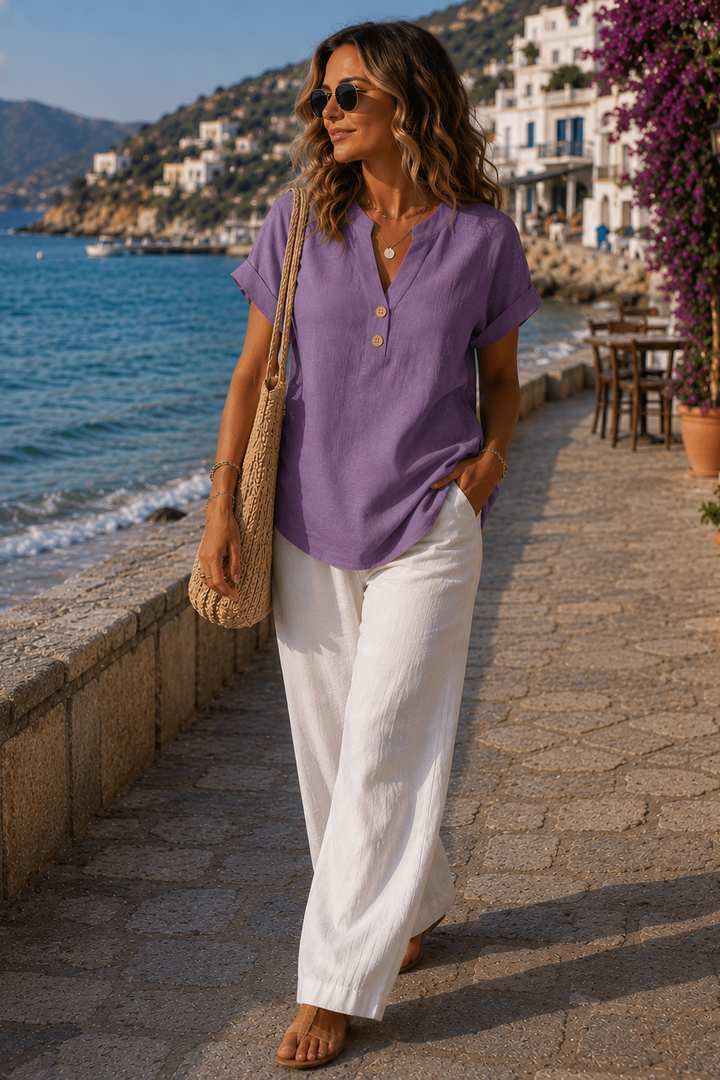 Relaxed fit women's casual shirt, breathable and stylish with button details, great for summer fashion.