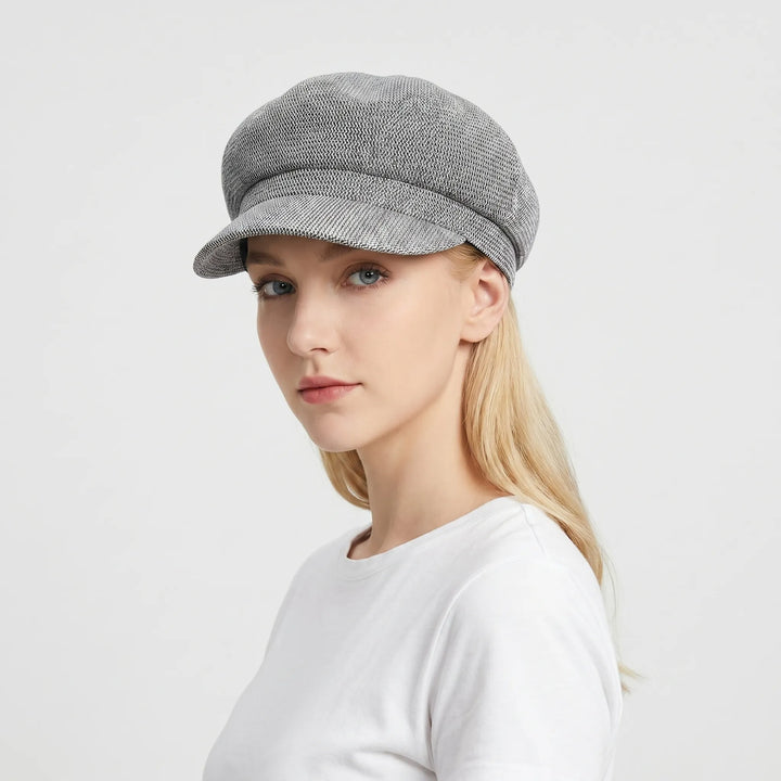 Open-weave sun hat for women, lightweight & breathable for beach, travel, and casual summer wear.