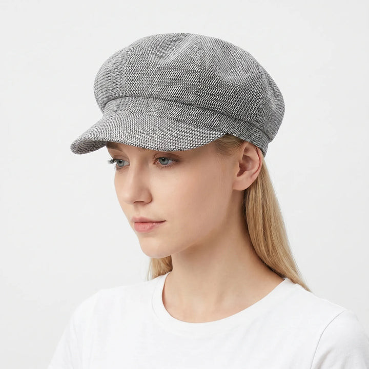 Close-up of a women's breathable open-weave sun hat, highlighting its texture for summer style.