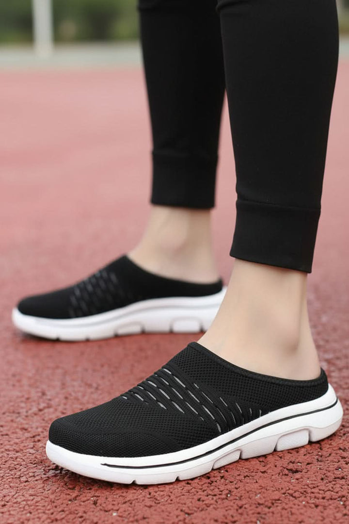 Women's breathable platform mule slip-on shoes for casual comfort. Lightweight & open-back for spring/summer wear.