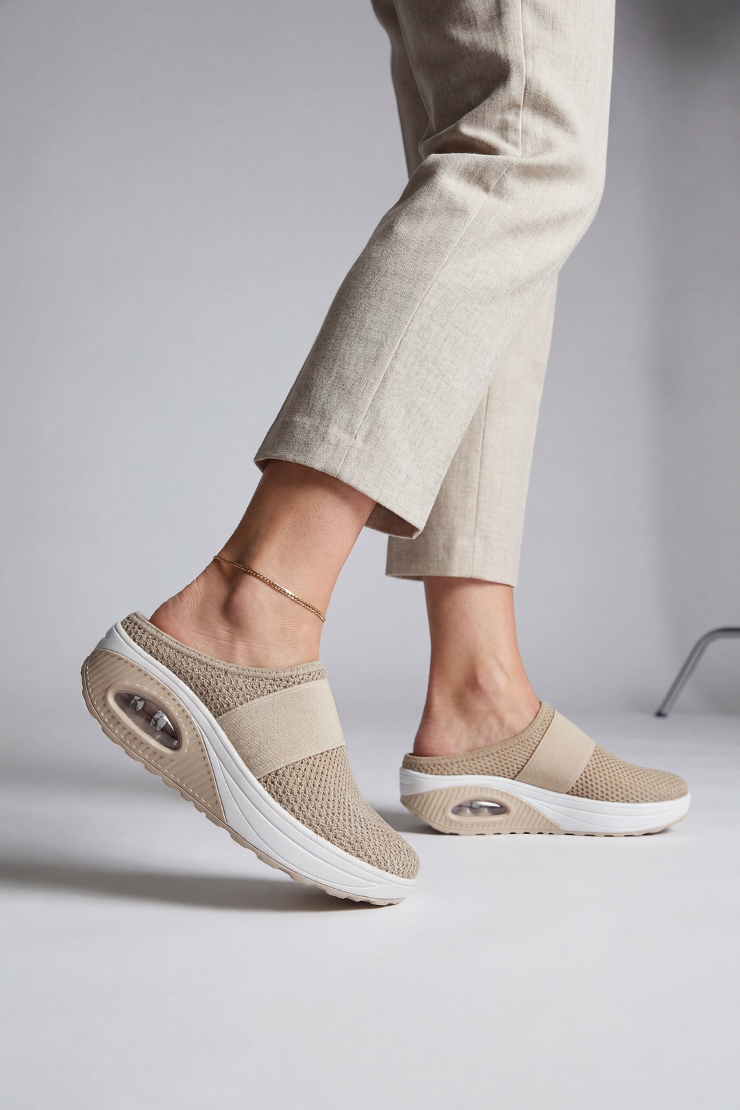 Comfortable women's slip-on mules, featuring breathable design & air cushion for easy wear, great for summer.