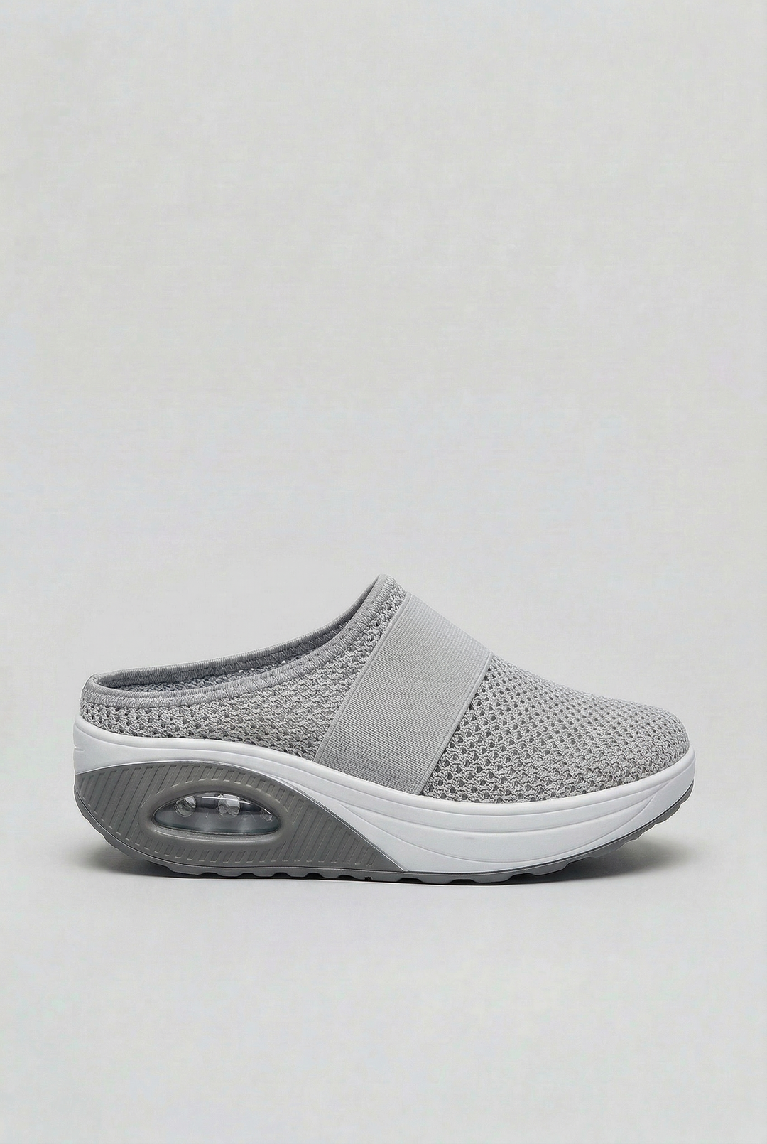Lightweight women's summer mules, slip-on style with breathable fabric & air cushion sole for all-day comfort.