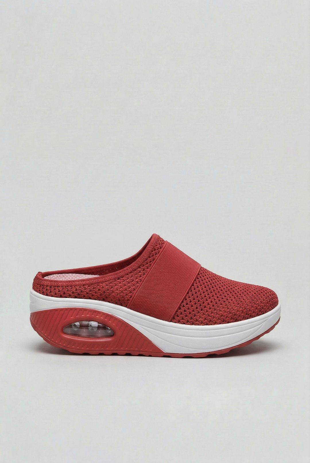 Women's breathable slip-on mules with air cushion technology, designed for maximum comfort and easy casual wear.