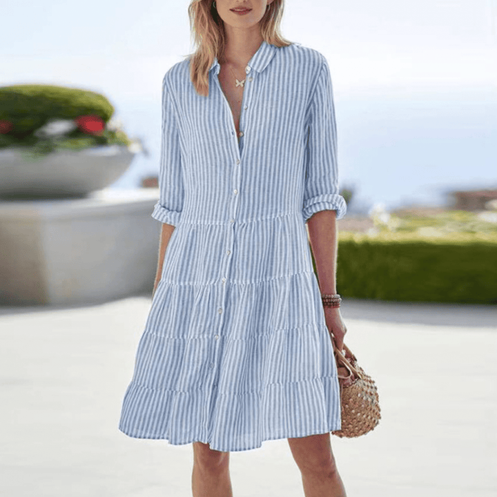 Casual women's striped A-line summer midi dress with front button details. Breezy & comfortable for everyday wear.