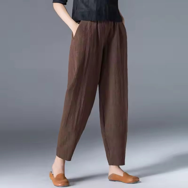 Relaxed fit women's summer trousers, elastic waist, breathable fabric for ultimate comfort.