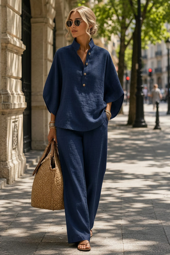 Complete women's two-piece outfit: comfy top & wide-leg trousers, great for casual outings or relaxation.