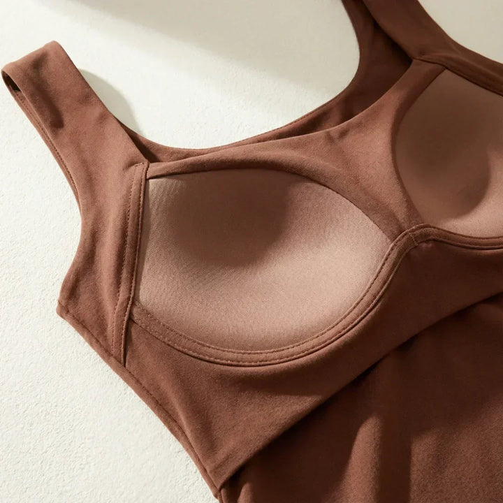 Activewear women's tank top featuring built-in bra support and a comfortable, flattering fit.