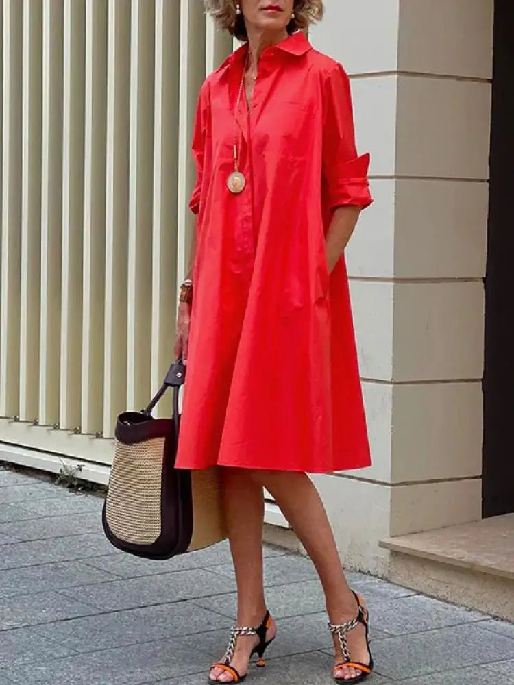 Stylish women's long sleeve A-line shirt dress with full button-front, perfect for everyday wear.