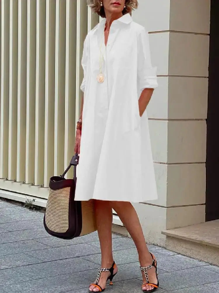 Elegant women's A-line midi dress featuring a button-front design, a comfortable and chic casual dress.