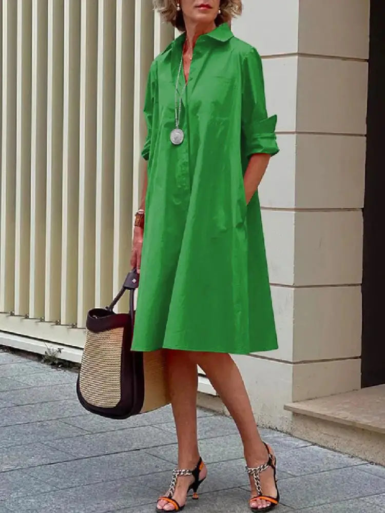Chic women's knee-length button-front shirt dress. A versatile A-line midi dress for various occasions.
