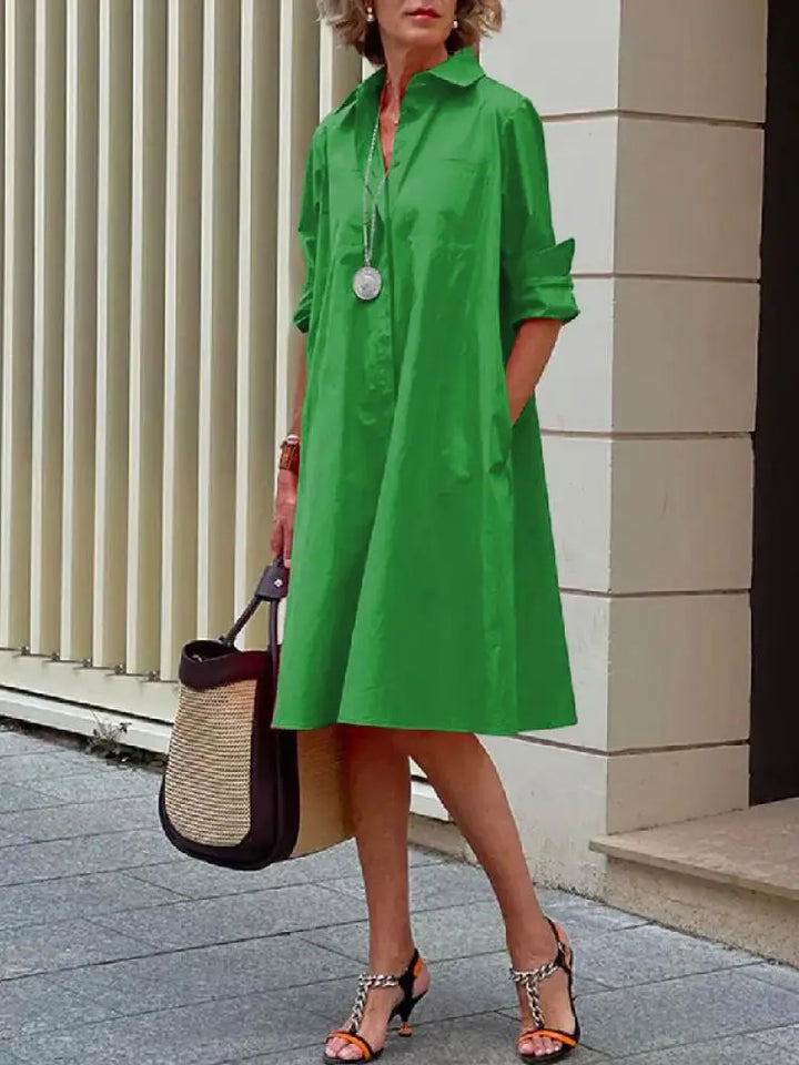 Chic women's knee-length button-front shirt dress. A versatile A-line midi dress for various occasions.