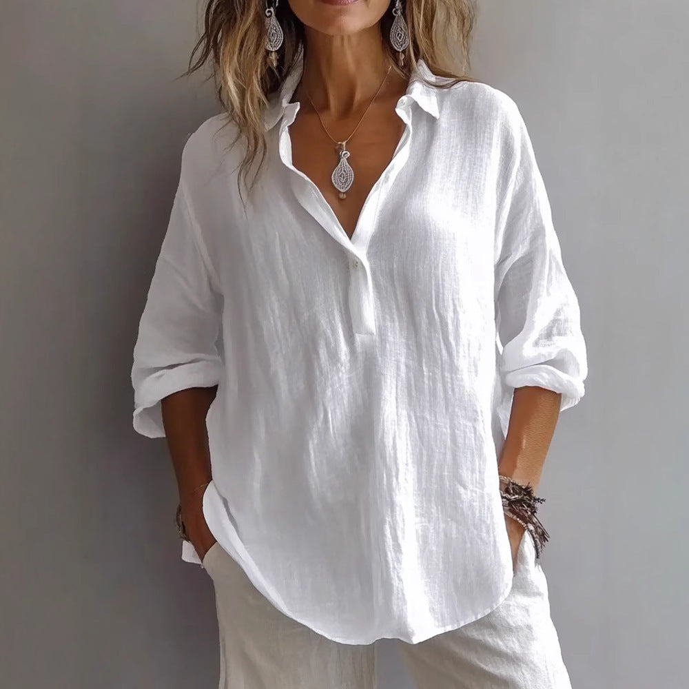 Women's button-front shirt with relaxed wide sleeves, perfect for casual summer fashion. Comfortable everyday wear.