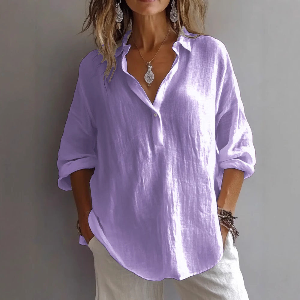 Stylish women's button-front blouse with wide sleeves & relaxed fit. Perfect for casual summer fashion.