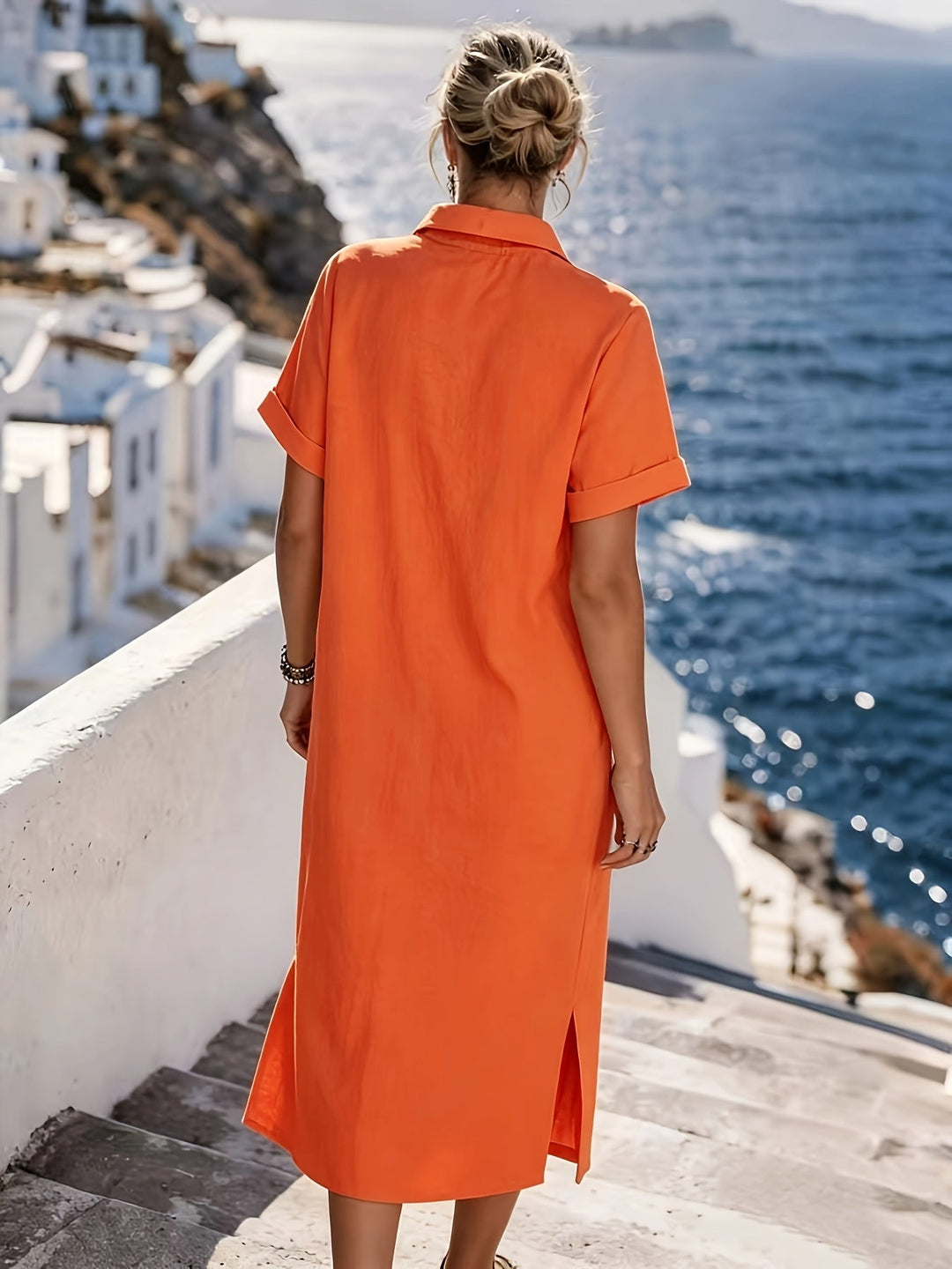 Comfortable women's short sleeve button-front dress, ideal resort wear & vacation style.