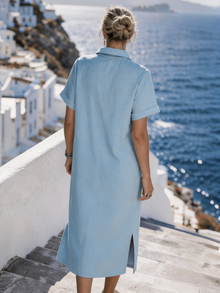 Chic women's vacation shirt dress, short sleeve and button-front design, comfortable midi.