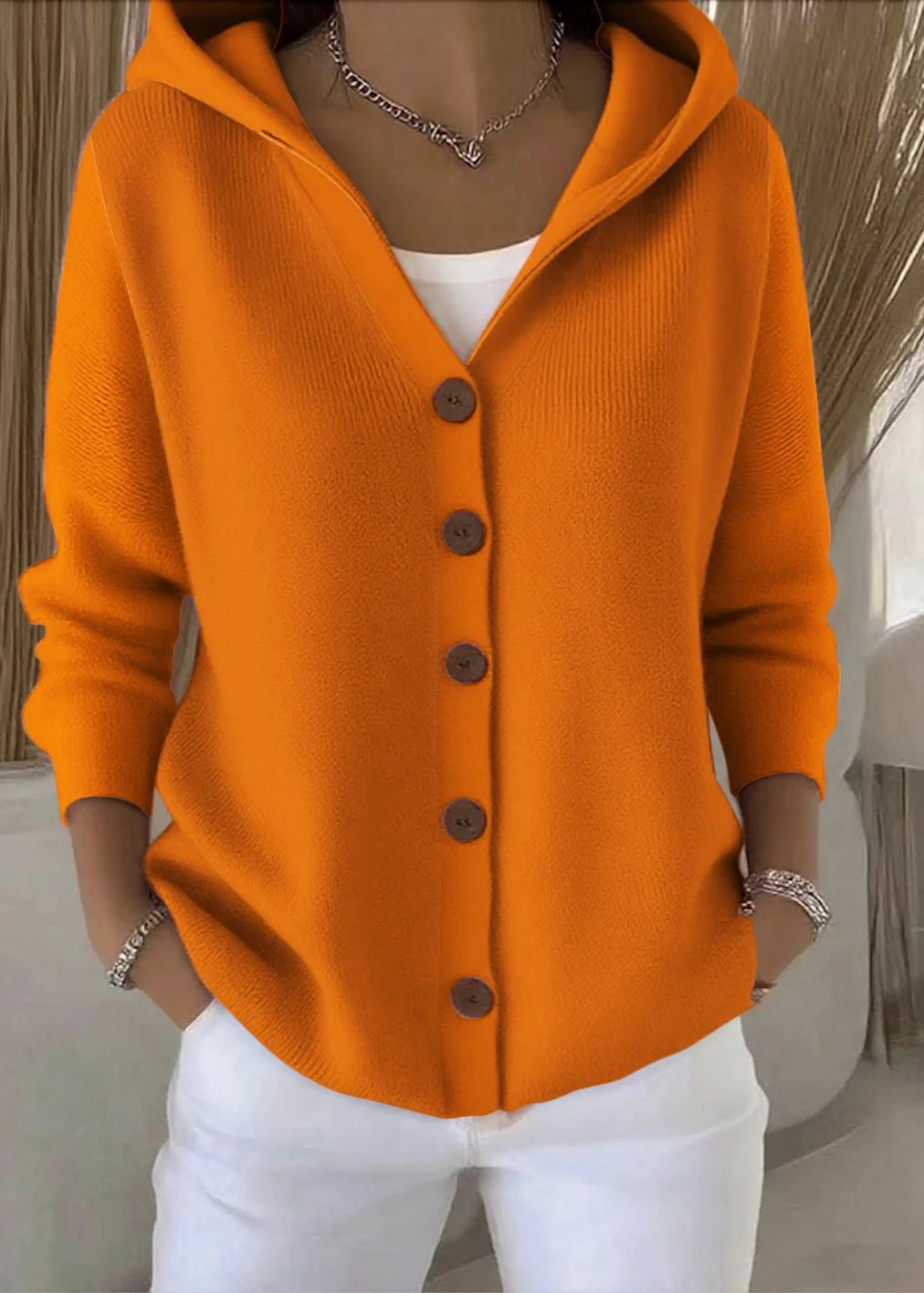 Comfortable women's hooded cardigan sweater. Soft button-up long sleeve for cozy fall & winter style.
