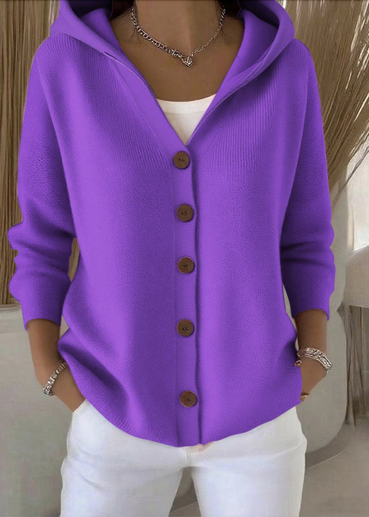 Plus size women's button-up hooded cardigan. Versatile long-sleeve sweater for casual wear.
