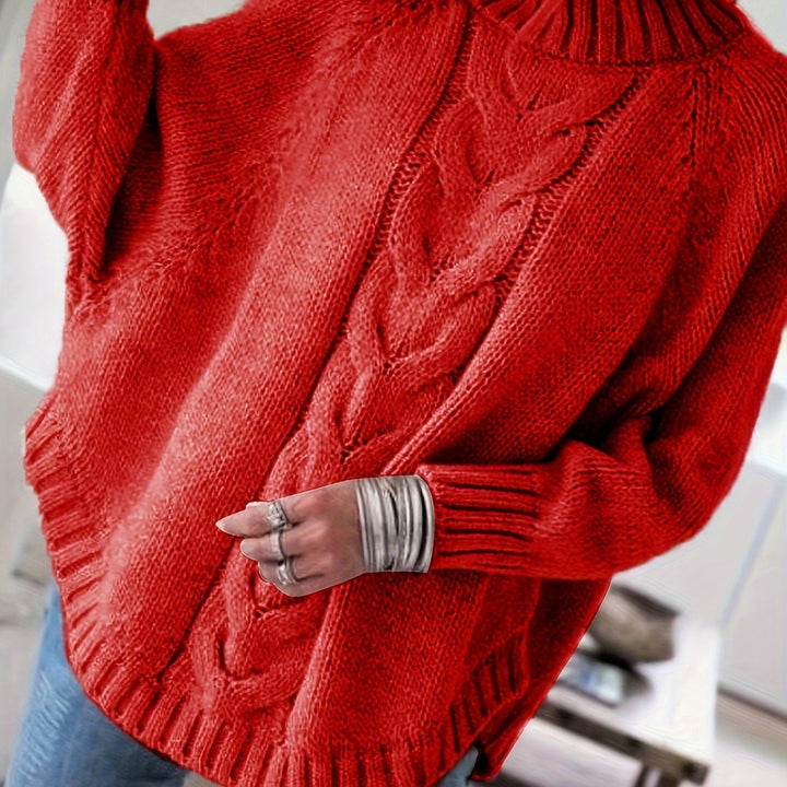 Must-have women's cable knit high-neck sweater with a beautiful flared hem for stylish fall outfits.