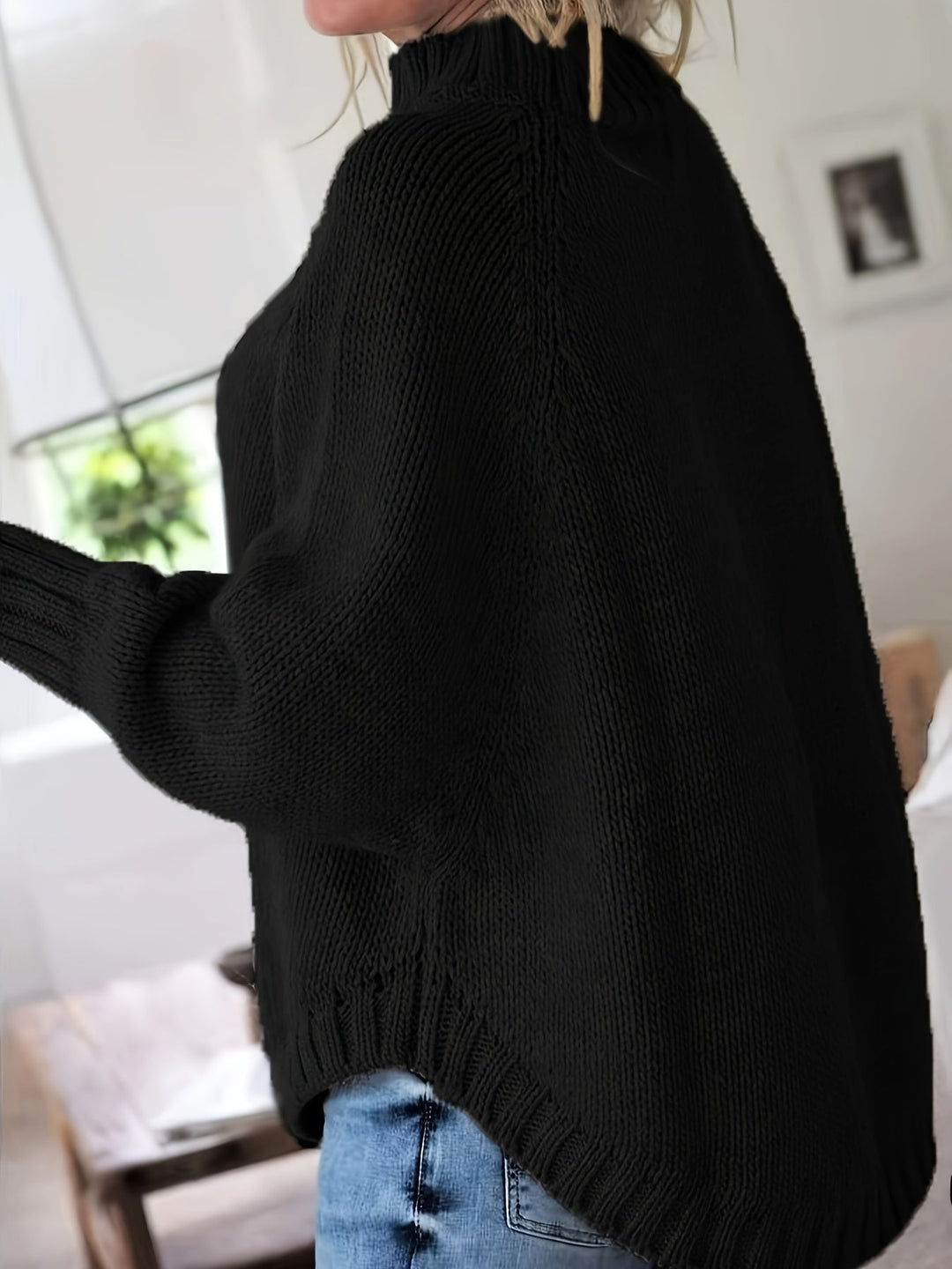 Women's long sleeve cable knit sweater, high neck, flared hem, a chic and cozy fall fashion.