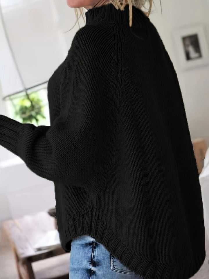 Women's long sleeve cable knit sweater, high neck, flared hem, a chic and cozy fall fashion.