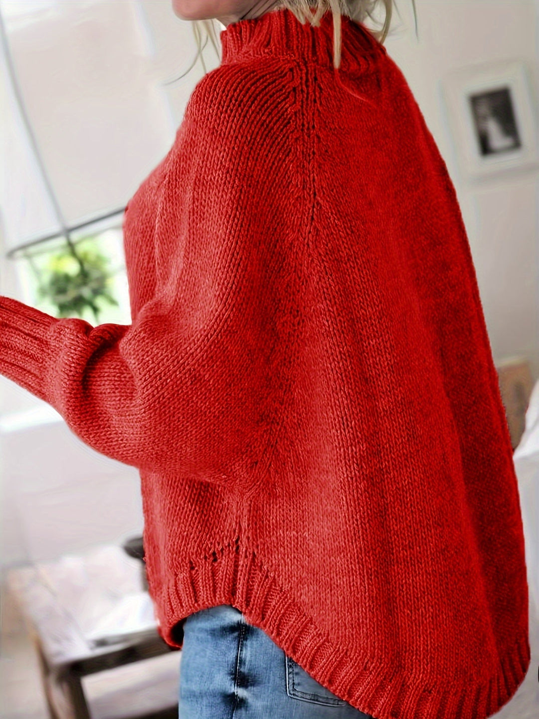 Casual yet chic women's cable knit high-neck sweater with flared hem, perfect for fall fashion.