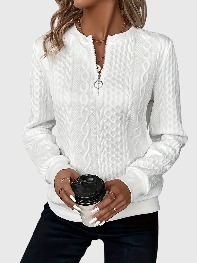 Long sleeve women's cable knit quarter-zip sweater, warm and stylish for cool weather.