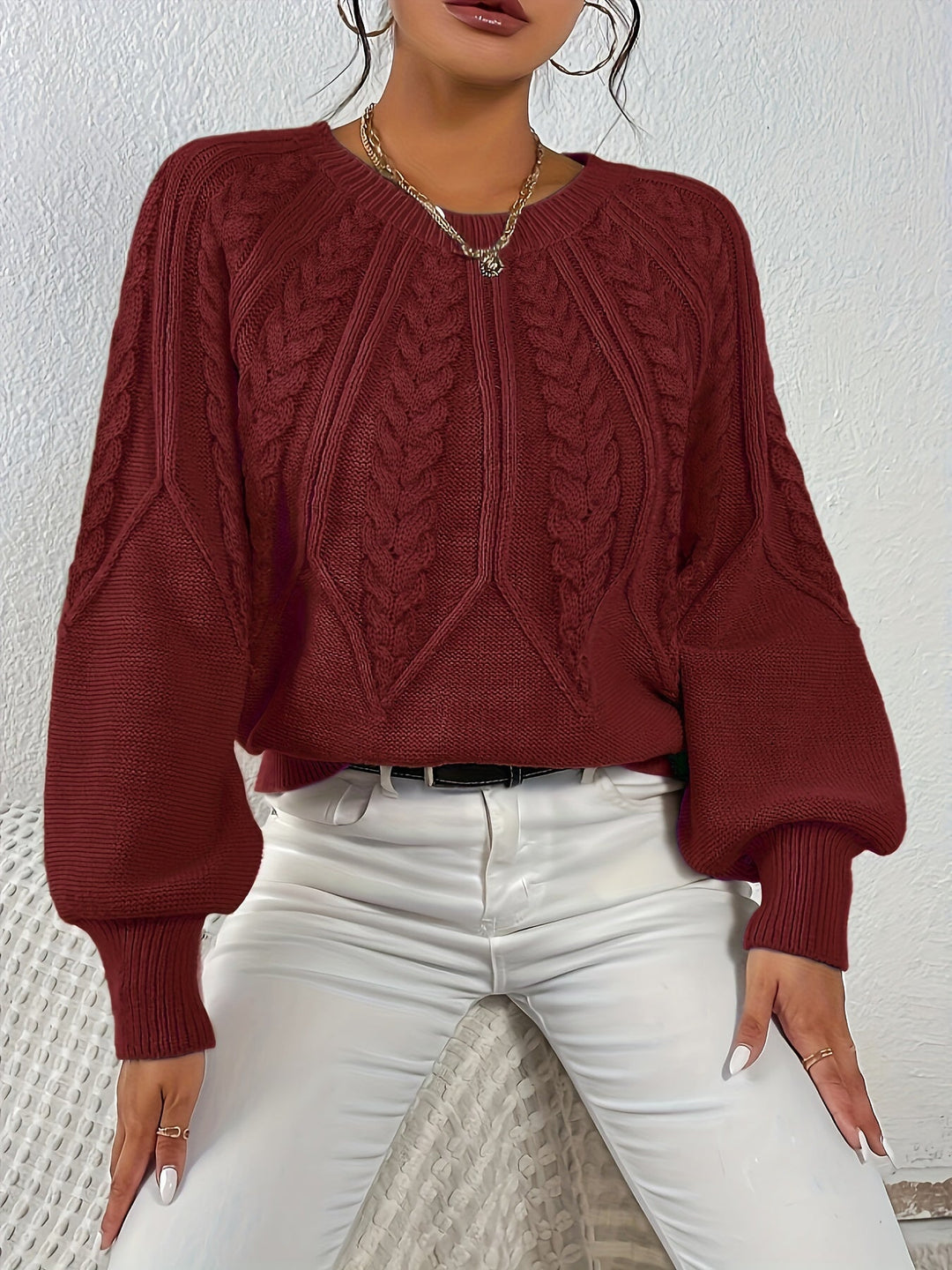 Relaxed fit women's long sleeve cable knit sweater, elegant lantern sleeves, casual chic.