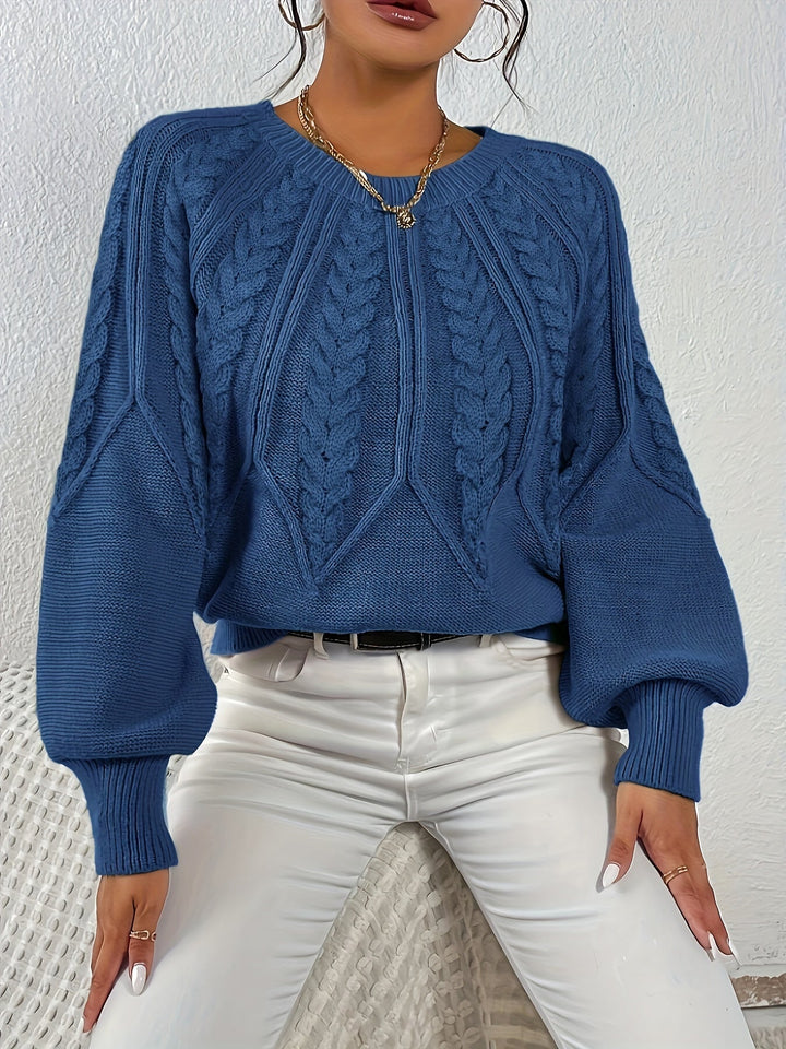Elegant women's relaxed fit cable knit sweater, featuring stylish lantern sleeves & rich texture.